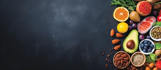 Aufkleber - Copy space image of trendy Alkaline diet products such as fruits vegetables cereals nuts and oils set against a dark blue concrete background create a healthy food background