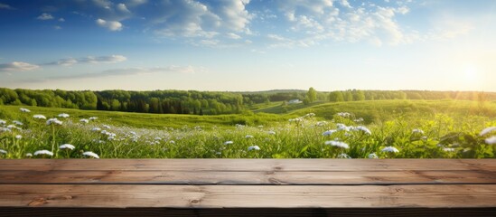 Aufkleber - A springtime panorama of a sun filled landscape with a wooden table in the foreground providing ample copy space for images