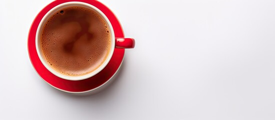 Poster - Top view of a red ceramic cup filled with steaming aromatic coffee on a white background Perfect for a copy space image