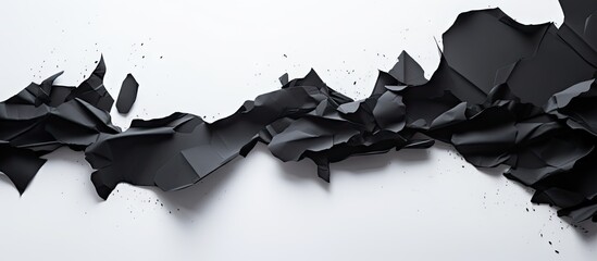 Aufkleber - There is a black paper with torn edges placed on a white background creating a space for an advertising copy
