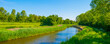 The edge of a canal in a rural area in springtime , Almere, Flevoland, The Netherlands, May 13, 2024