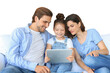 © ty - Positive friendly young parents with smiling little daughter sitting on sofa together answering video call on digital tablet while relaxing at home on weekend on a transparent background