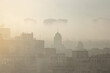 Kyiv in the morning fog, smoke, and dust from Africa - ecology pollution conceptual landscape photo