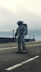 Wall Mural - astronaut in space suit on the road bridge