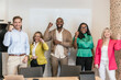© ADDICTIVE STOCK - Diverse team celebrating success at coworking space