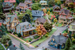 A miniature model of a neighborhood with houses and trees