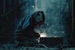 © ttonaorh - Welder working with protective mask welding metal in the factory. Metalwork manufacturing and construction concept