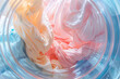 Colorful clothes swirling in a washing machine