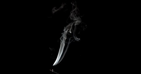 Wall Mural - Real smoke on a black background. Thin Flexible Trickle of Real Smoke. Colorful real smoke rises up. Ideal for background or over-layer with blending mode add, screen, lighten.