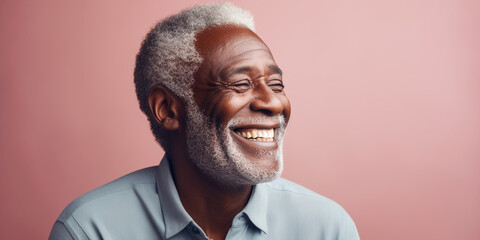 Wall Mural - Happy African American senior man in his 70s on a solid background