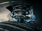 Fototapeta  - shock absorber strut with coil spring, suspension system of modern car