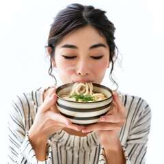 Poster -  Japanese lady enjoying a bowl of freshly prepared udon noodles