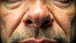© artsakon - Detailed image of a nose with flared nostrils, capturing a moment of intense emotion or surprise