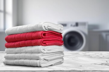 Poster - Stack of clean sheets and cloth in laundry room