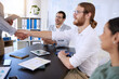 © peopleimages.com - Handshake, business people and interview in office for job recruitment, hiring and marketing team. Success, congratulations and collaboration for partnership or career promotion in workplace