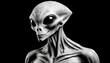Black and white portrait of a grey alien on black background.