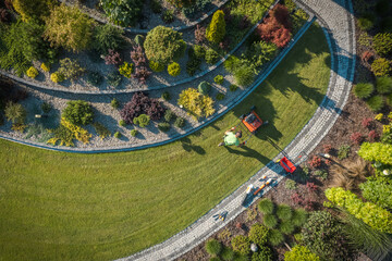 Wall Mural - Aerial View of Landscaper Aerating Clients Lawn