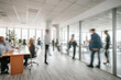 © Medical Works - business people walking in the corridor of an business center, pronounced motion blur, crowded bright modern light office movement defocused. office background busy. talking and rushing in the lobby.