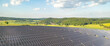Many solar panels in the beautiful countryside during the day