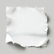 A Torn White Paper Piece on Grey Background.