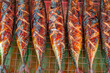 grilled mackerel fish, street food market, selective focus