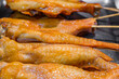 grilled chicken wings, street food market