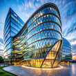 A striking office building featuring curved glass windows and a geometrically inspired structure. 
