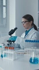 Aufkleber - In the laboratory, the molecular biologist studies the genetic mechanisms of oncogenesis to develop new methods for diagnosing and treating cancer. An analytical pharmacist analyzes medicines to