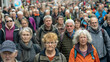 © RISHAD - Large crowd of elderly people walking together in a city street. The image captures the collective movement and diversity of the senior community.