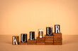 Culture word in German. Wooden alphabet letters on a light background