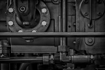 Poster - a close up of a machine with many bolts and nuts. concept of complexity and intricacy, as well as th
