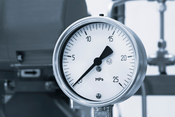 Aufkleber - A close up of a pressure gauge on a machine, industrial concept