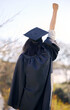 © peopleimages.com - Graduation, celebration and back of student with cheers at college or achievement in education. Study, success and person at university on scholarship with pride for winning diploma or fist in air