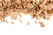 Pile of wood chips for flavoring barbecue and grilled foods isolated on a white background, view from above.