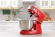 © New Africa - Modern red stand mixer on light gray table in kitchen, space for text