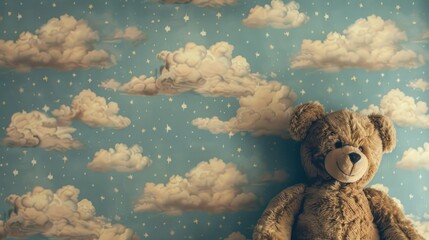 Wall Mural - Placing a stuffed bear against a backdrop of cloud patterned wallpaper