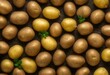 AI generated illustration of Freshly harvested potatoes stacked on a table