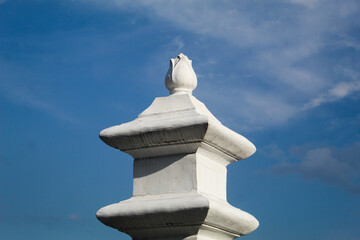 Monuments or forms of architectural monuments are white. Ancient Javanese architectural monument with blue sky background