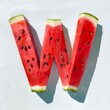 Alphabet Letter W Shaped Watermelon Slice, White Background.