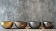 Elegant Rustic Metal Bowls on Concrete Background Interior Design.