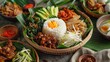 Tasty Indonesian nasi campur platter with egg