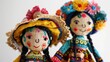 © AkuAku - Beautiful handmade Mexican rag dolls displayed against a white backdrop