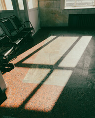 Sticker - Shadow from a window on a tiled floor. Abstract background