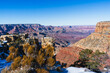 Spectacular Winter View of Grand Canyon with Snow and Blue Skies
