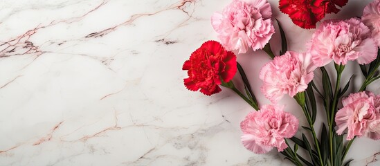 Aufkleber - Top view of a stunning bouquet of pink and red carnations on a marble table This beautiful arrangement is perfect for Mother s Day or Valentine s Day with a flat lay design and plenty of copy space f