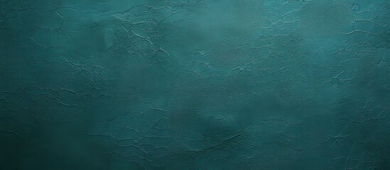 Wall Mural - A visually appealing dark petrol green blue texture background ideal for graphic design with plenty of copy space image