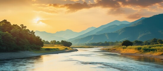 Poster - During the golden hour of sunset a picturesque mountain river flows providing a serene backdrop with ample copy space for text