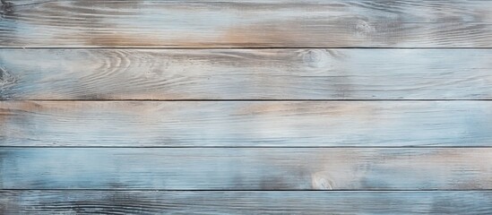 Poster - A vintage teak surface board or grunge plywood with a natural old antique pattern creating a pastel blue wooden wall texture background for design artwork or a floor Ample copy space image is availab