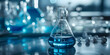 © Mian - Glass flask in blue research chemistry science banner laboratory background