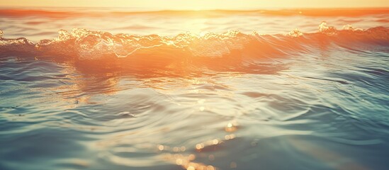 Aufkleber - Blurry tropical sunset beach with the bokeh effect of sunlight on the waves creates an abstract background The image allows for copy space representing an outdoor summer vacation and travel adventure